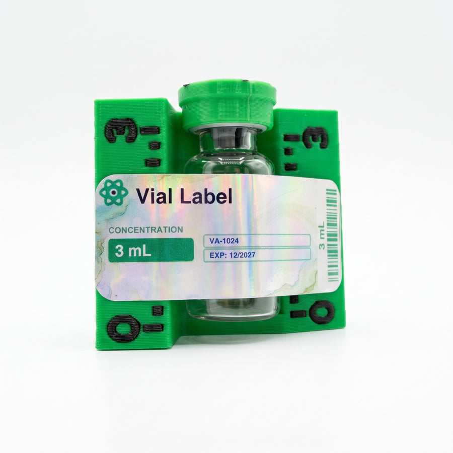 3 mL numbered applicator holding a vial with its label applied straight against the printed ruler