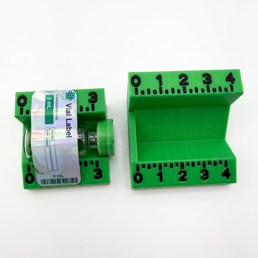 3 mL applicator holding a labelled vial on its side next to the 10 mL applicator